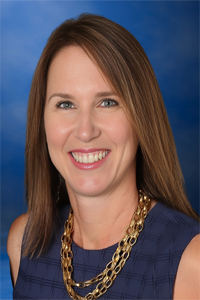 Christine Keyes - Head Shot - Blue Background_web